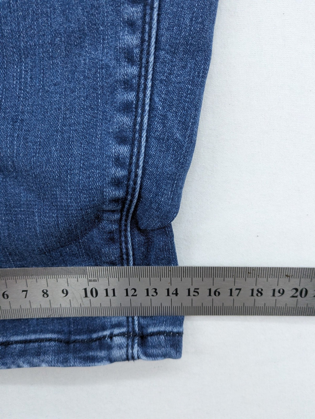Tom Tailor blue skinny jeans with classic 5-pocket design and double button closure.
