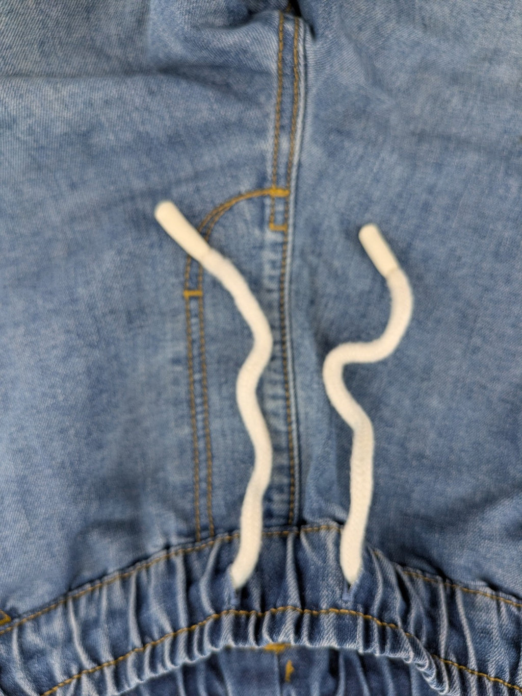 C&A blue denim shorts with elastic waistband and decorative drawstring, classic style.