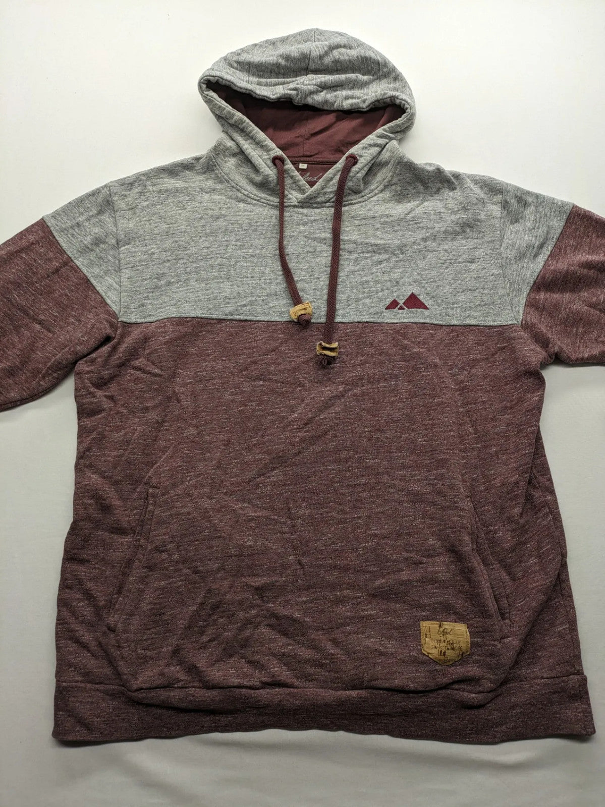 Bleed turtle neck jumper grey burgundy colorblock design with adjustable hood and kangaroo pocket.
