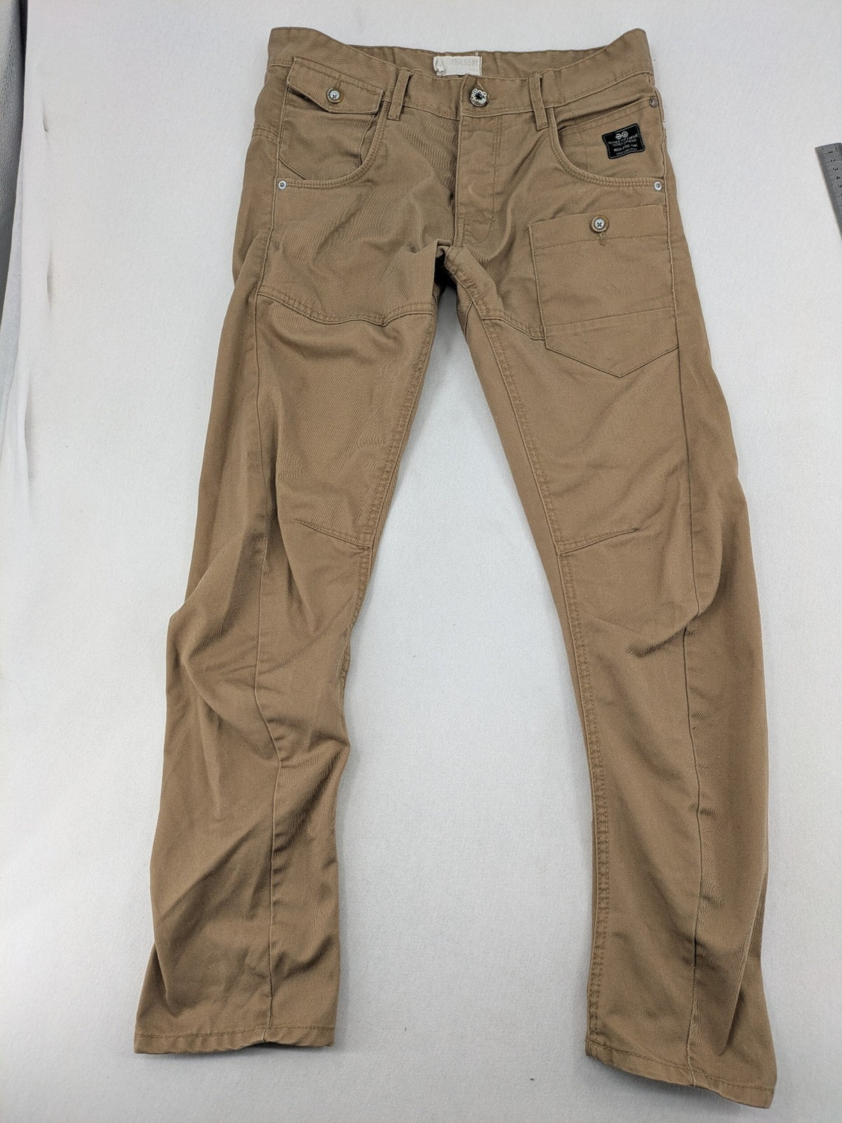 Crosshatch grey cargo pants with multiple pockets and durable cotton-polyester blend.