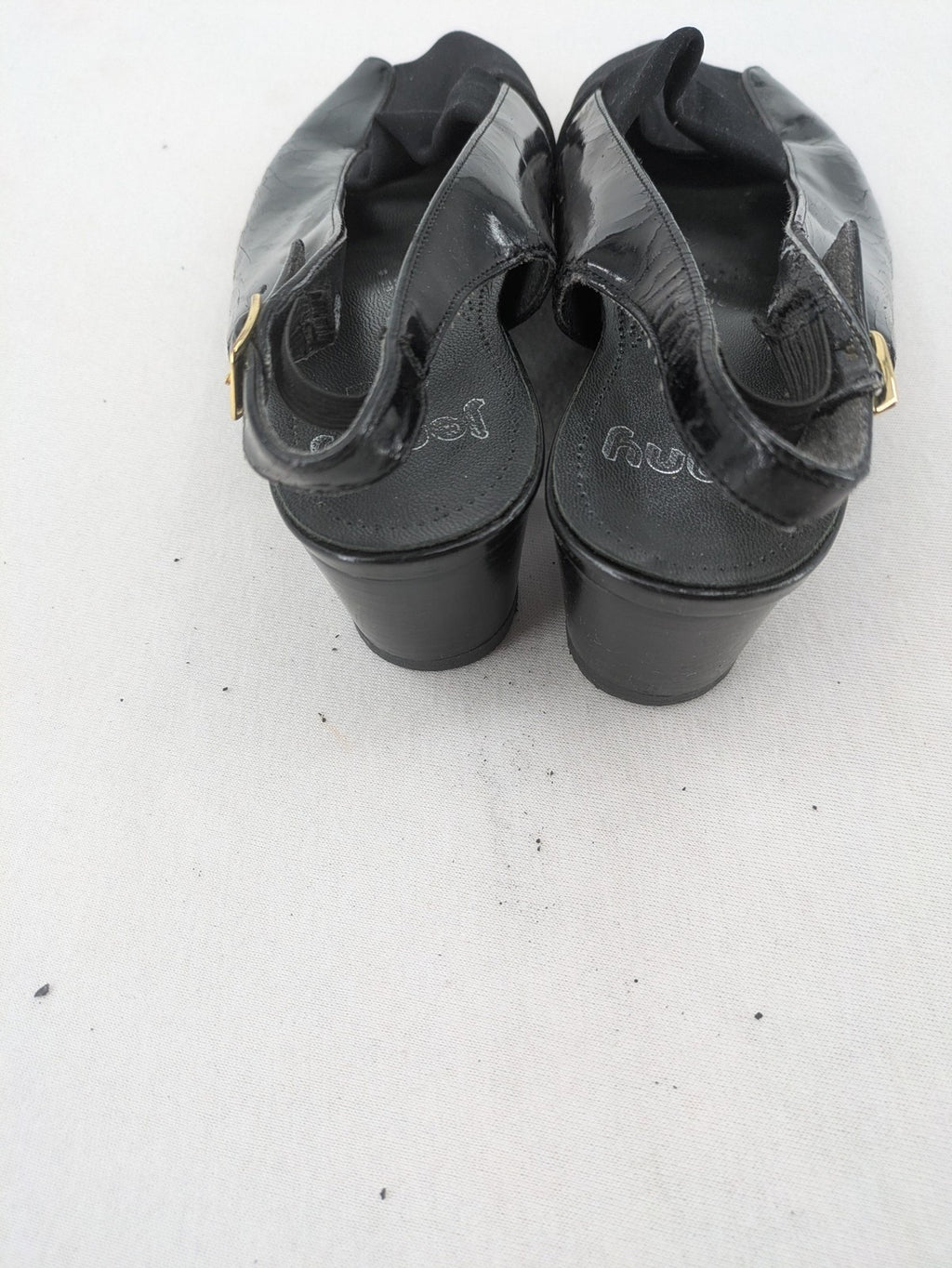 Jenny by Ara black slingback pumps with peep-toe front and glossy finish.