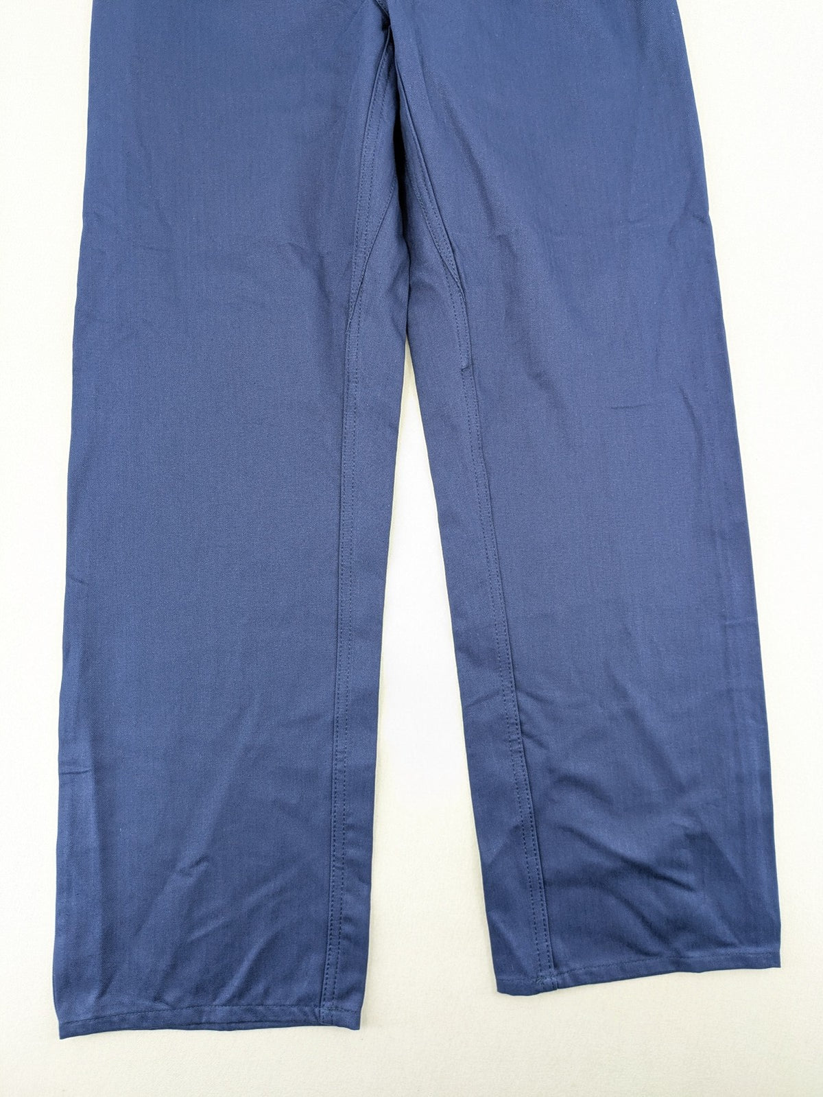 Uvex blue work pants 100% cotton with elastic waistband and straight leg design.