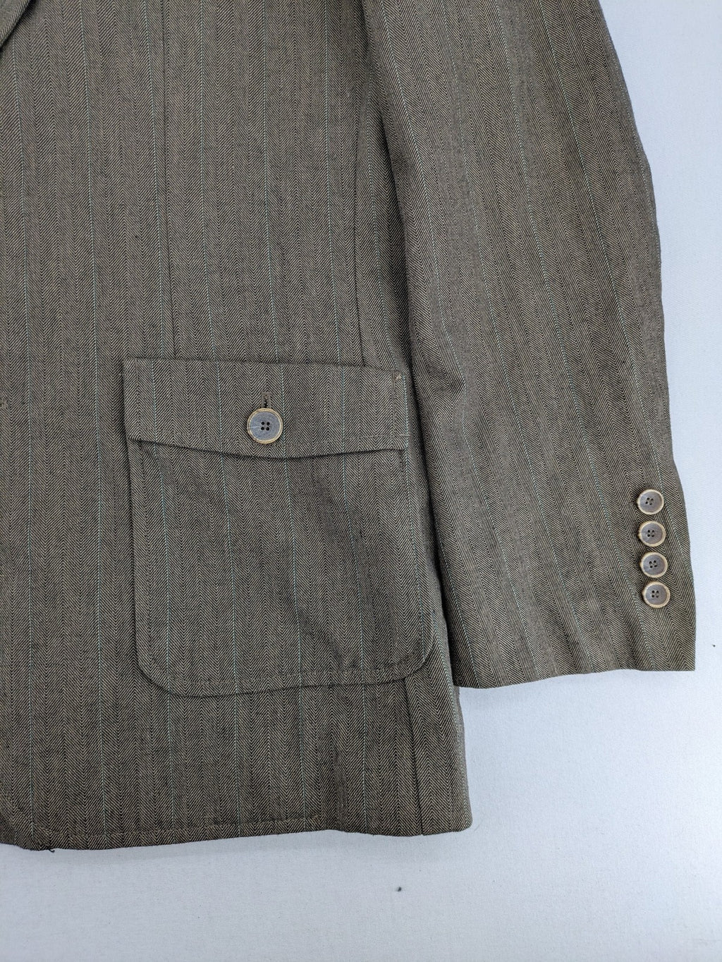 Springfield pink blazer with subtle pinstripe pattern and patch pockets.