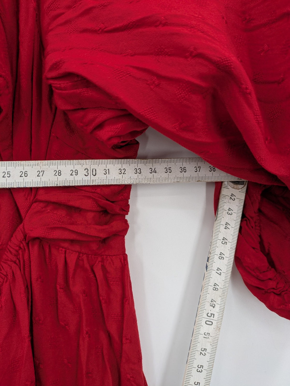 NEXT red midi dress with puff sleeves, smocked bodice, and stylish back cut-out.