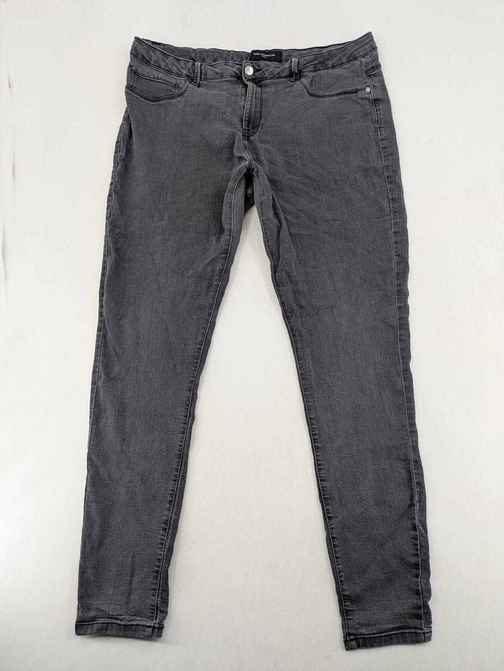 ONLY Carmakoma grey skinny fit jeans with subtle washed look and stretch denim material.