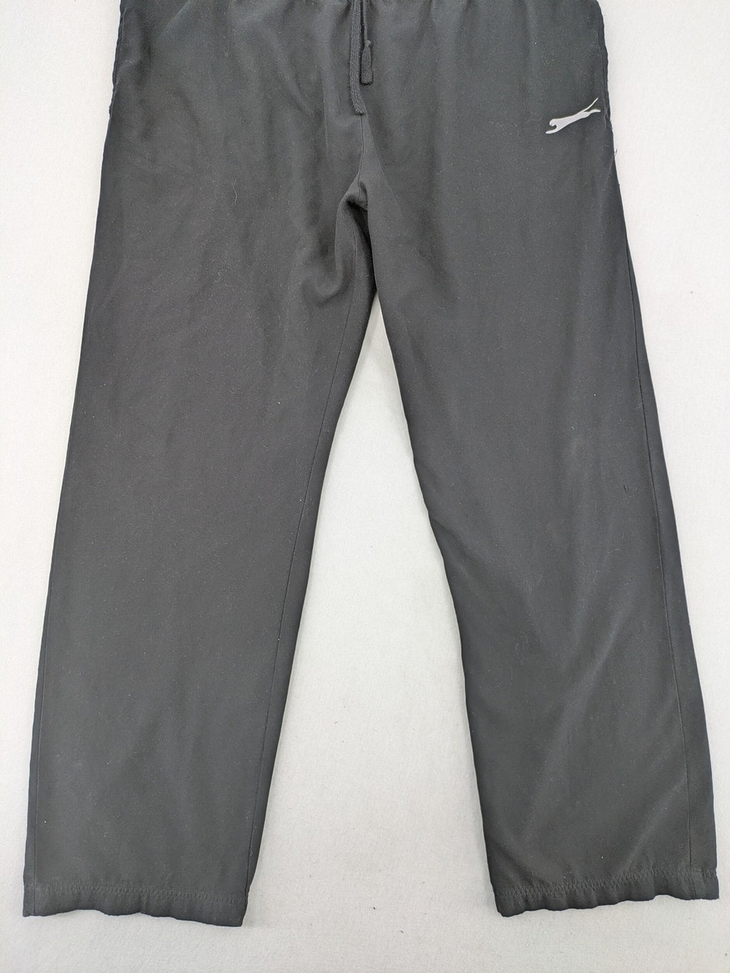Slazenger grey loungewear joggers with adjustable drawstring and subtle logo on thigh.