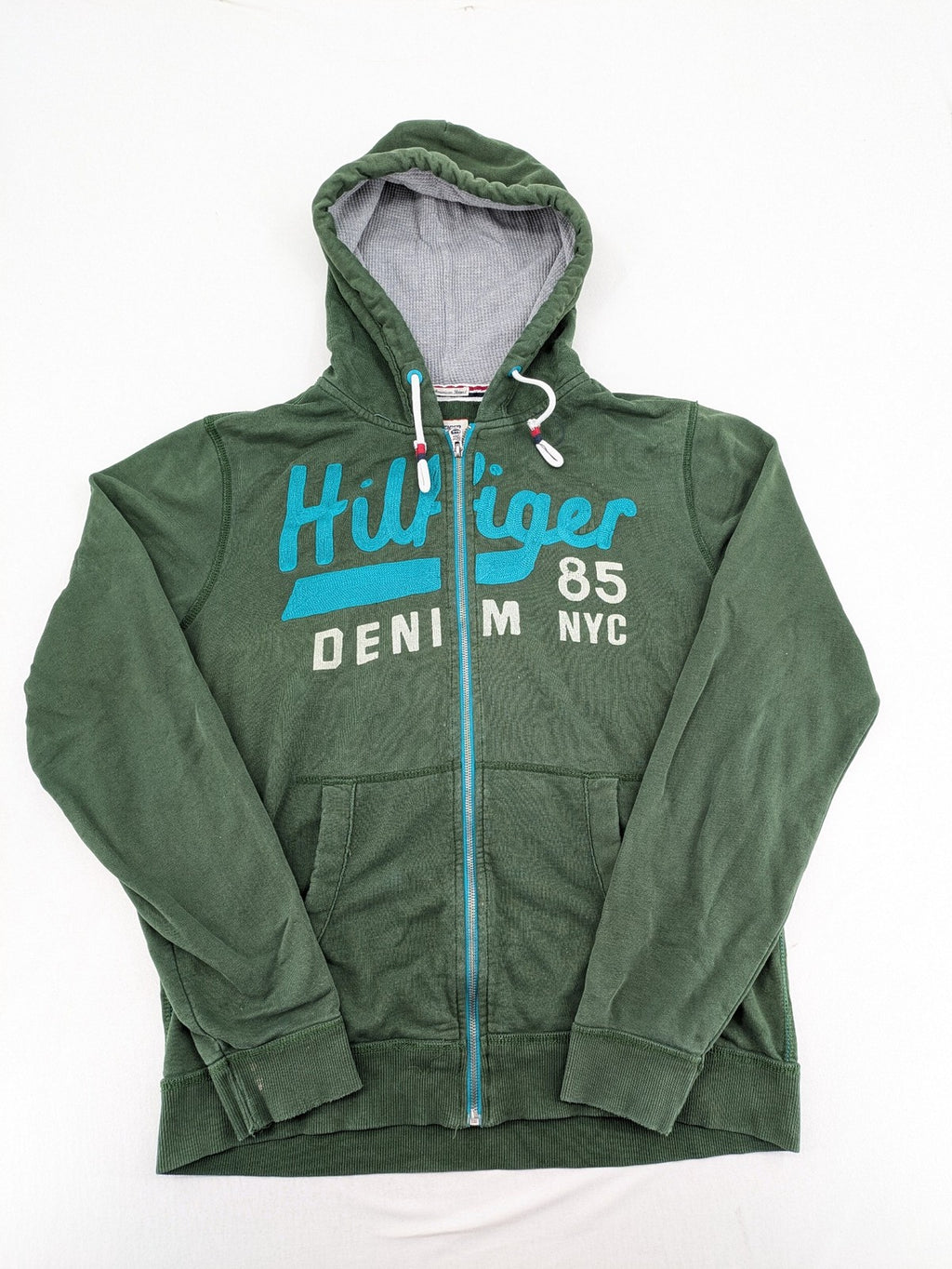 Tommy Hilfiger Denim green hoodie full zip with large graphic logo and grey waffle lining.