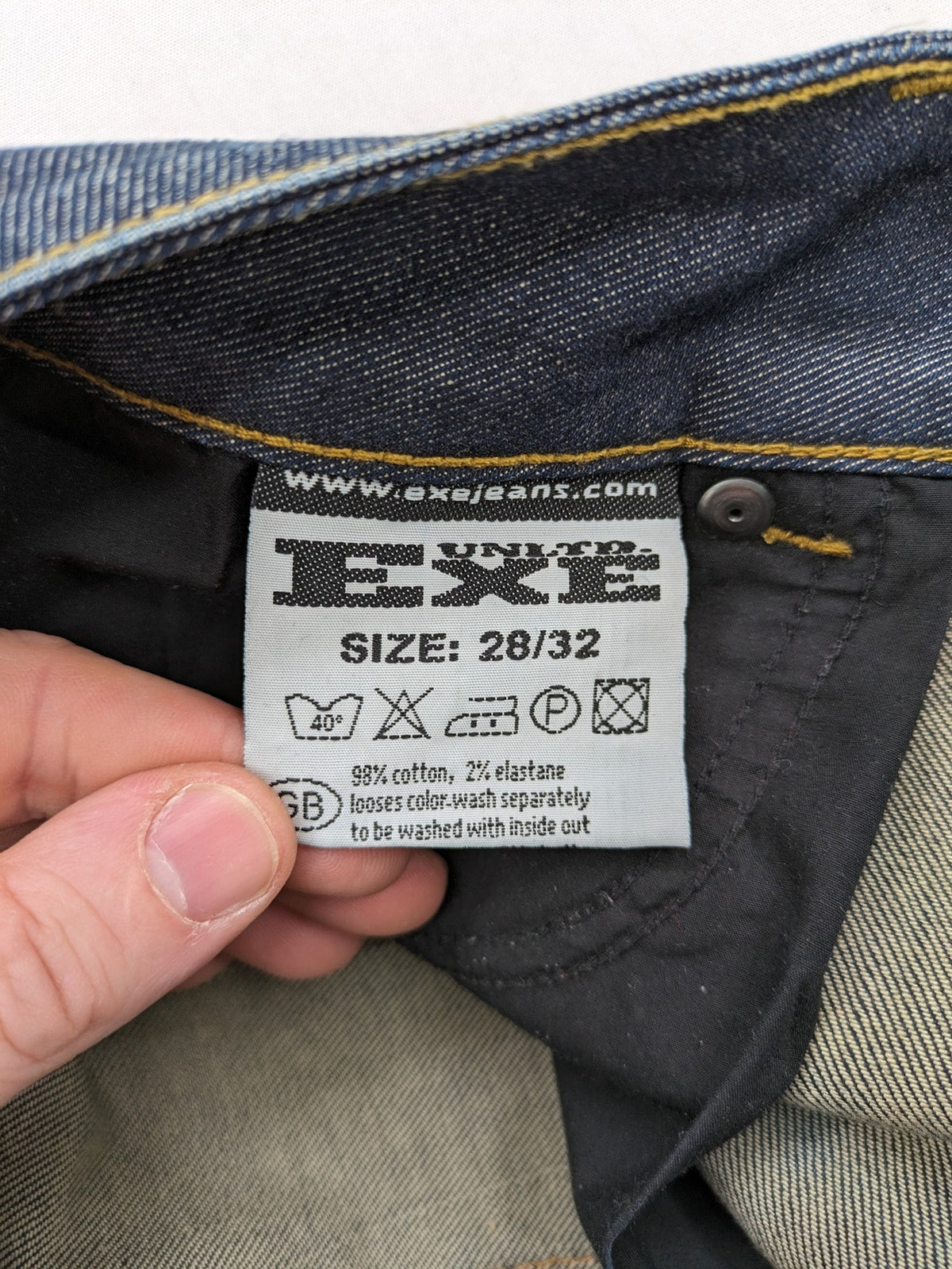 Exe blue straight jeans slim fit bootcut stretch denim with classic 5-pocket styling.