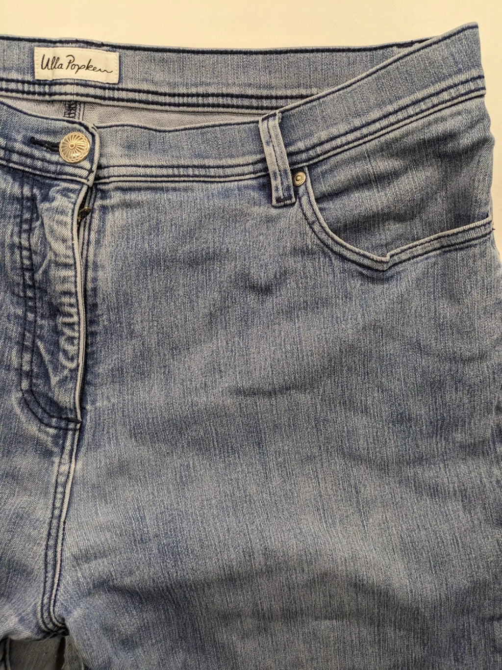 Angels blue straight jeans with five-pocket design and vertical front seams.