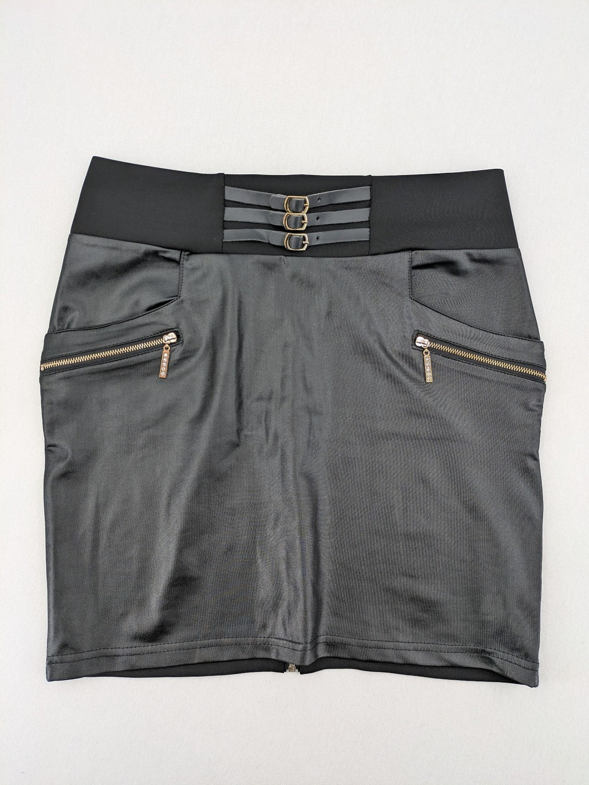 Romatie black mini bodycon skirt satin finish high waist with gold zippers and buckles.