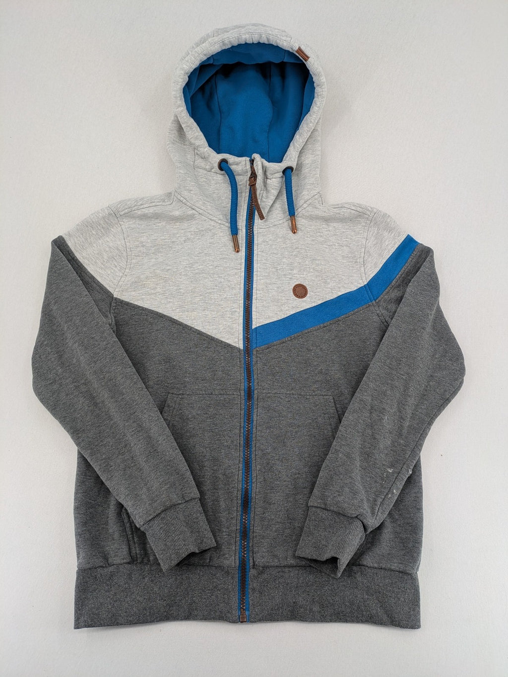 ALIFE turtle neck jumper blue grey colorblock design with logo details and soft cotton blend.