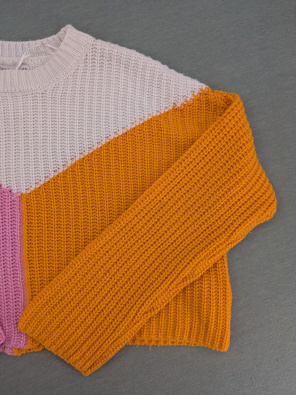 Sincerely Jules orange and pink colorblock turtle neck jumper with soft acrylic fabric.