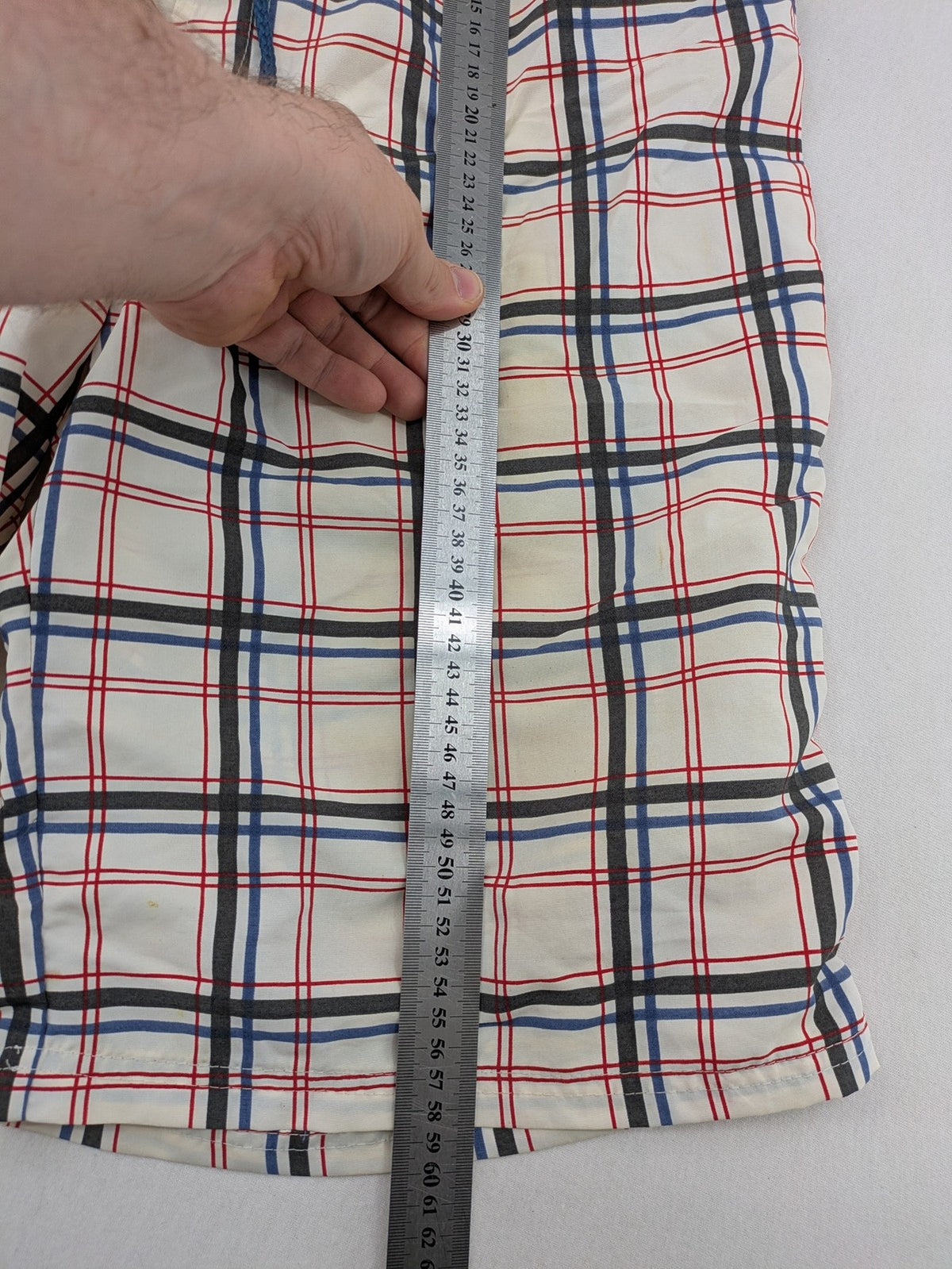 Crivit multi-coloured board shorts with classic check pattern and adjustable drawstring waistband.