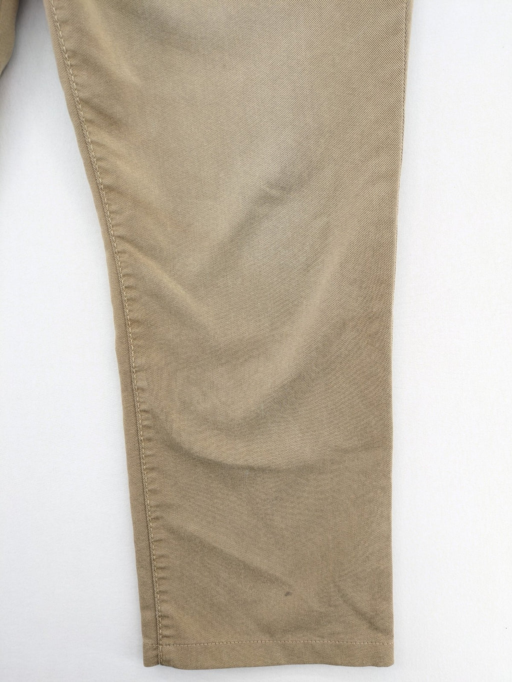 Joker beige straight jeans with double saddle stitching and classic 5-pocket design.