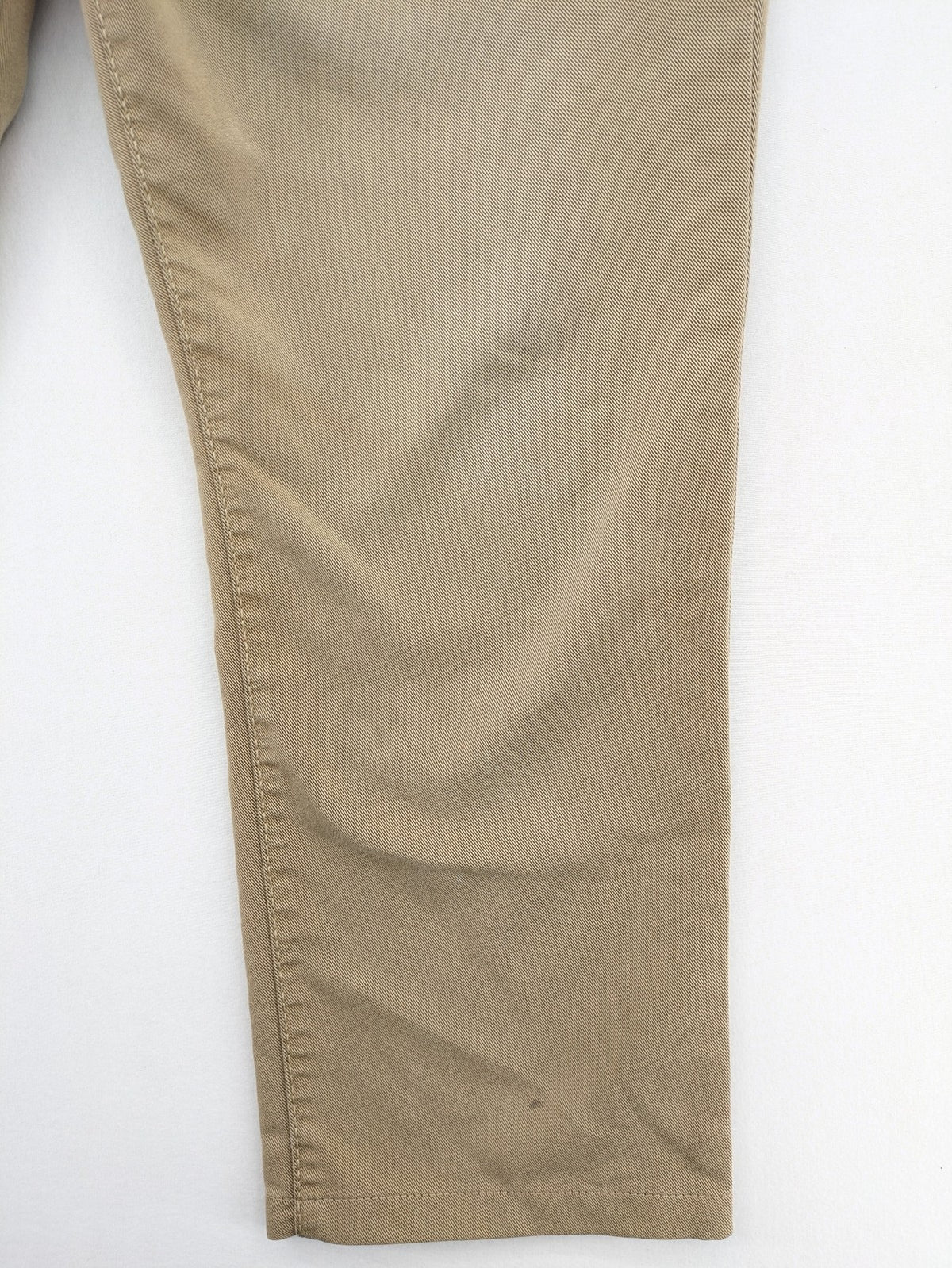Joker beige straight jeans with double saddle stitching and classic 5-pocket design.