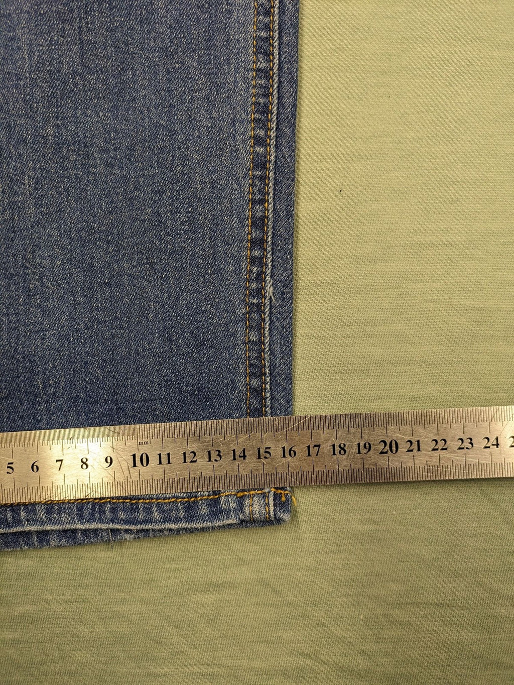 Peg blue ripped straight jeans with distressed details and comfortable stretch material.