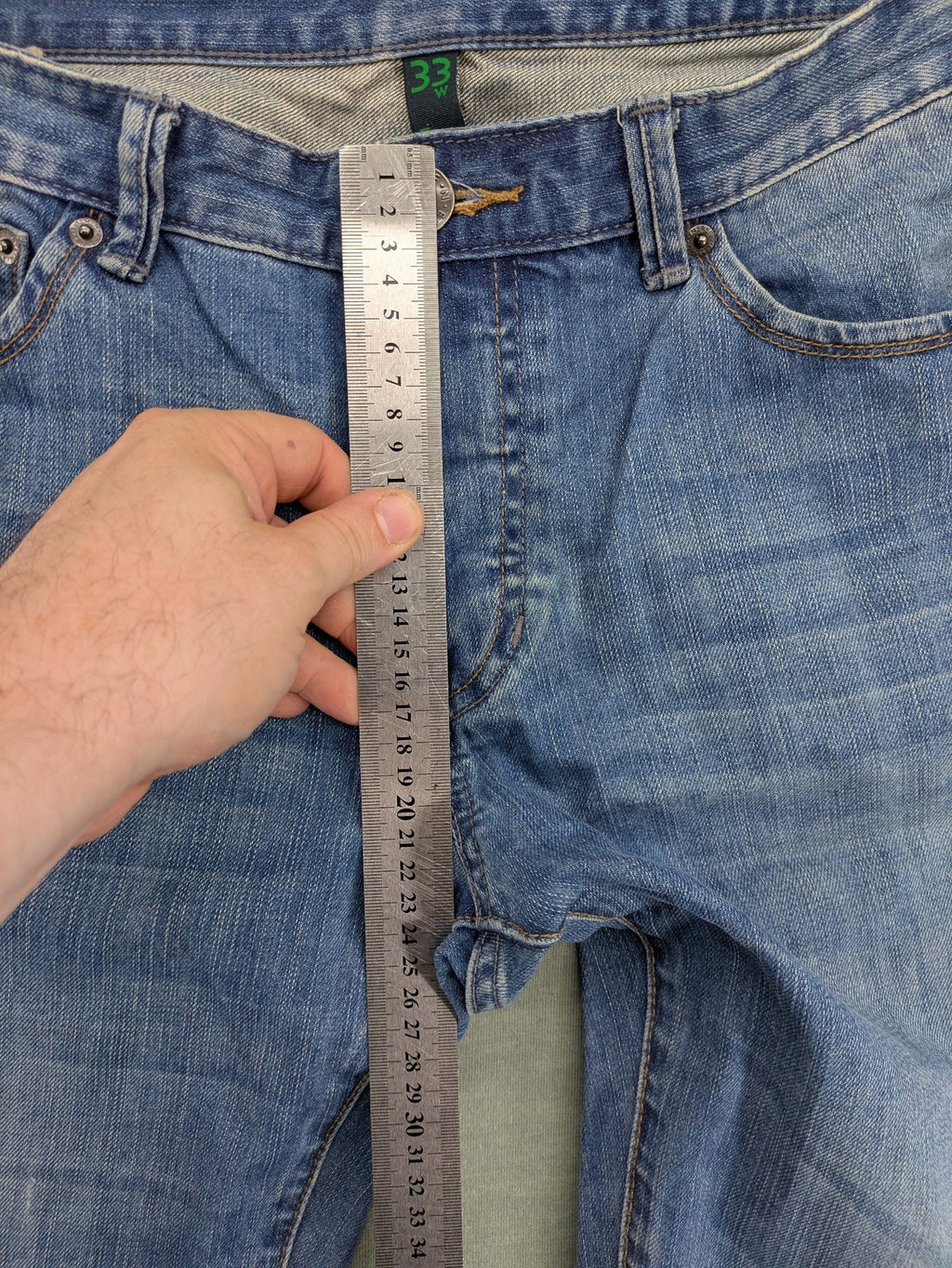 Benetton Jeans blue straight leg denim with button fly and classic design.