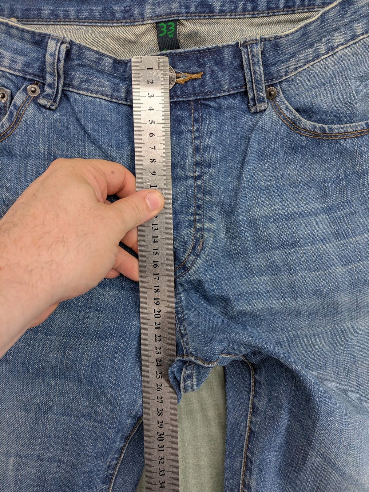 Benetton Jeans blue straight leg denim with button fly and classic design.