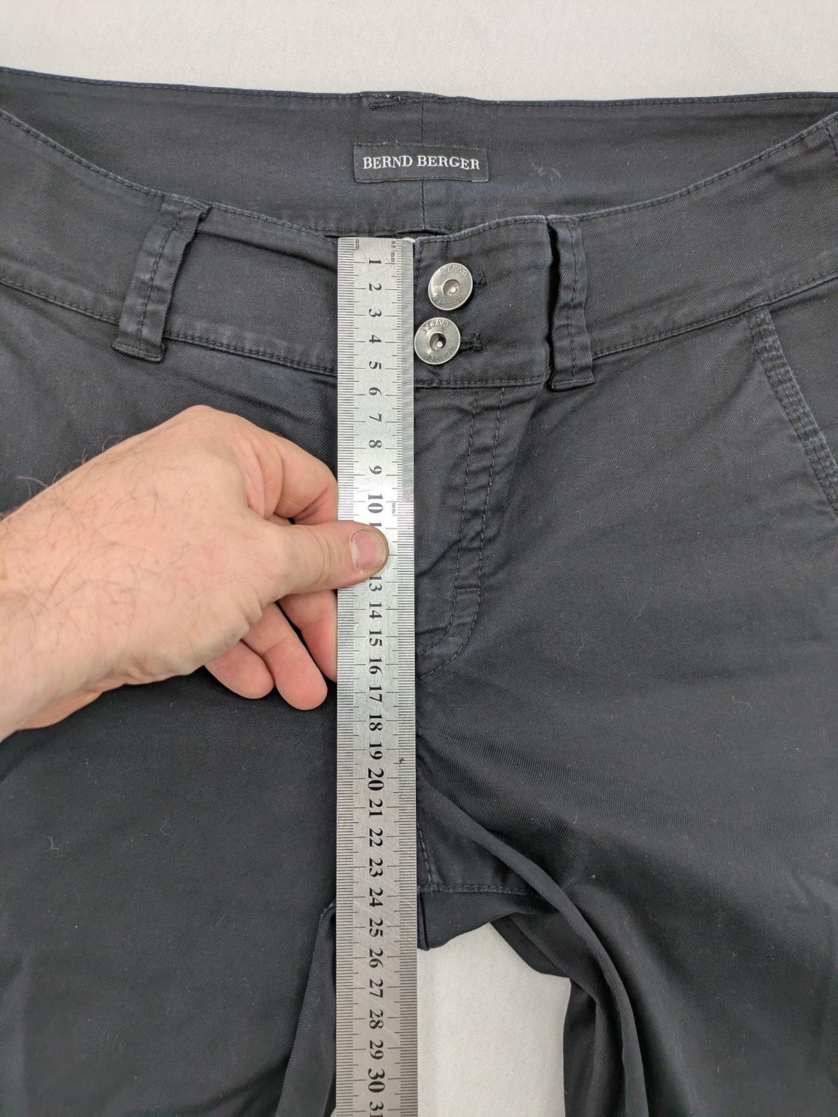 Bernd Berger grey chino pants with double button closure and straight leg design.
