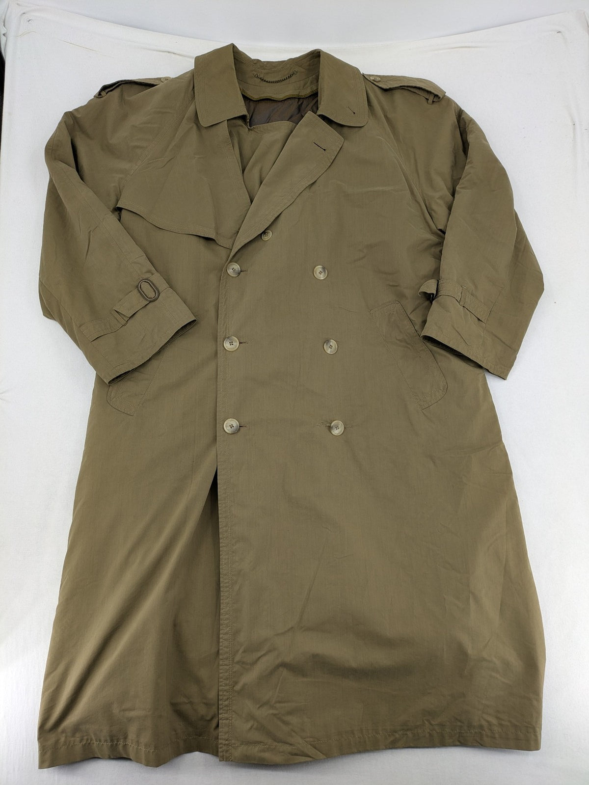 Studio Novum khaki trench coat double-breasted design with belt and wool lining.