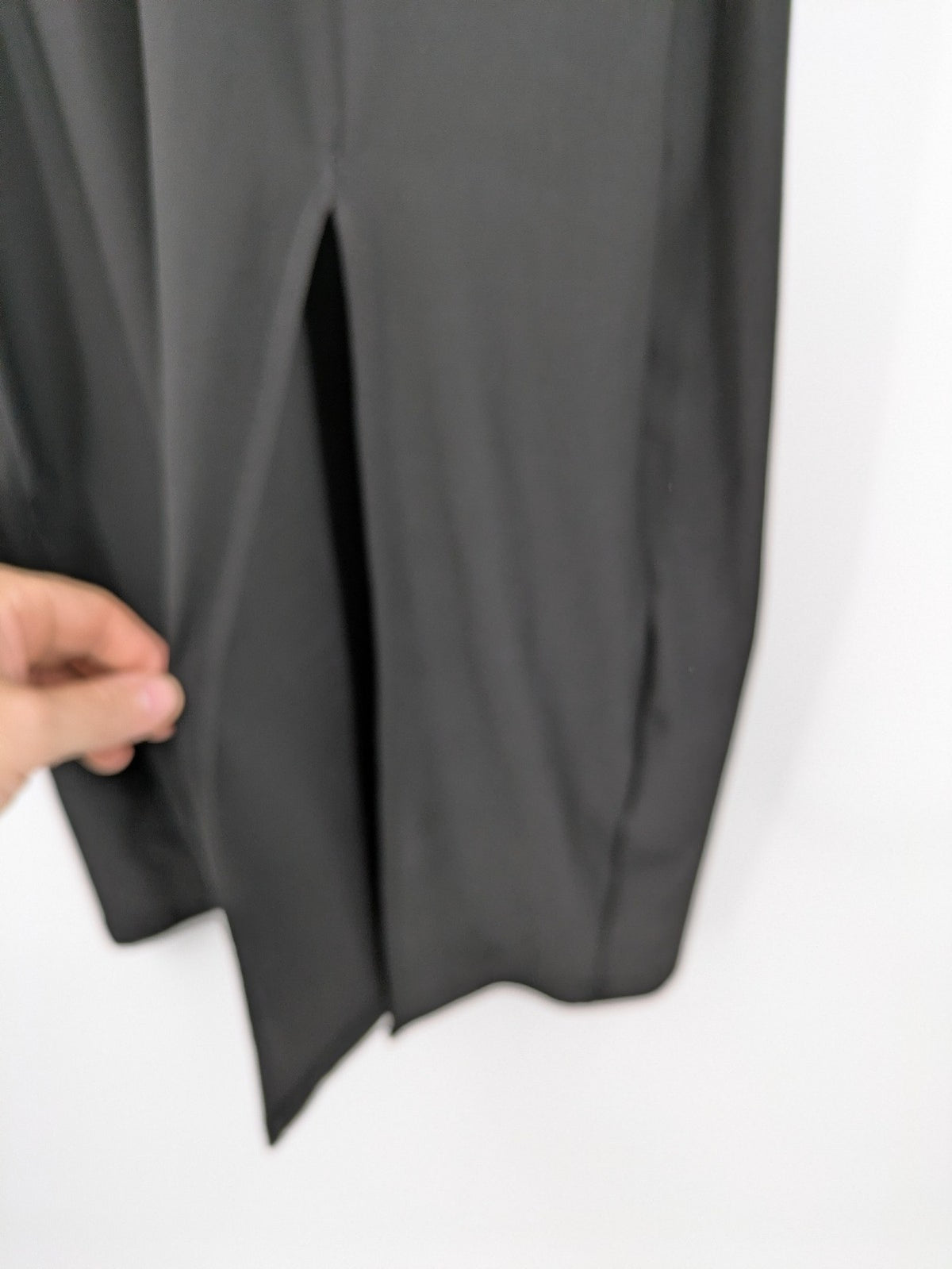 Milano black bodycon T-shirt dress with stylish print and side slit detail.