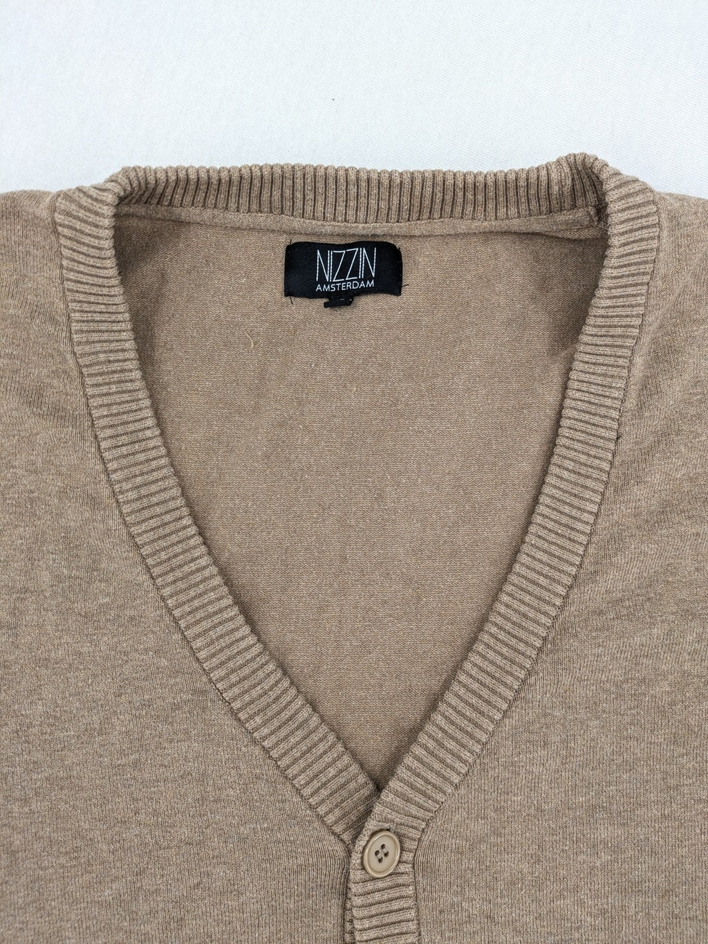 Nizzin Amsterdam knit jumper beige V-neck with button placket and soft cotton blend.