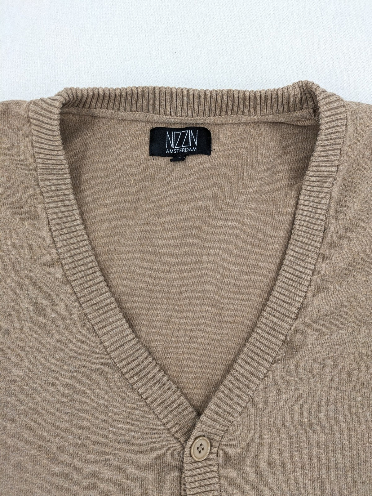 Nizzin Amsterdam knit jumper beige V-neck with button placket and soft cotton blend.