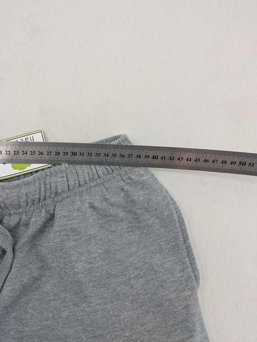Skid Row grey joggers with red band logo, soft cotton blend, elastic waistband.