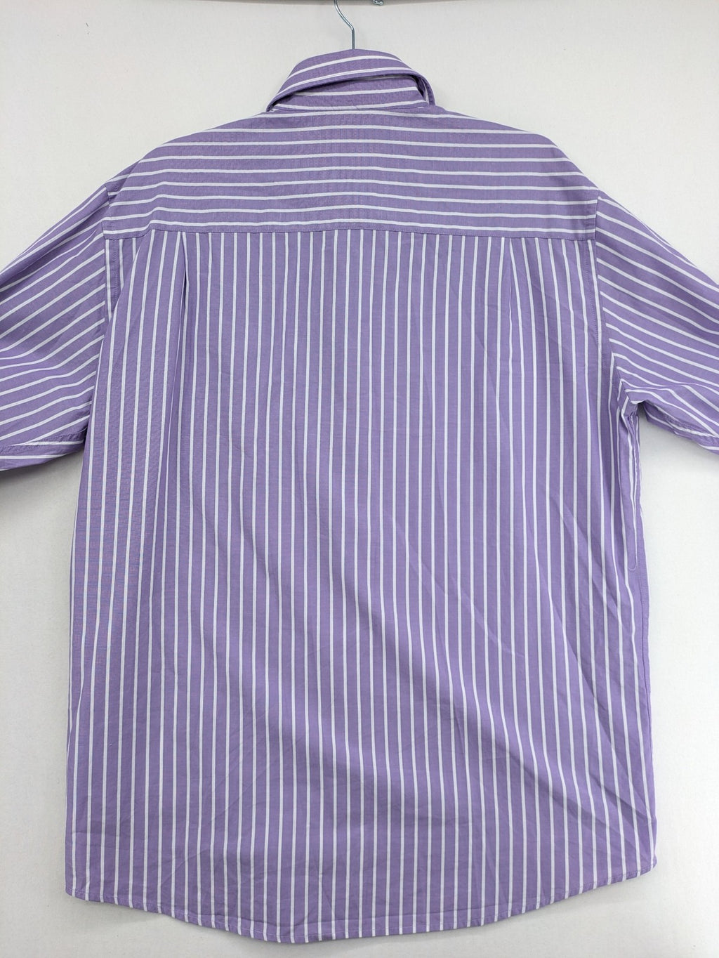 C.Comberti pink button-up shirt with vertical purple and white stripes, easy-care fabric.