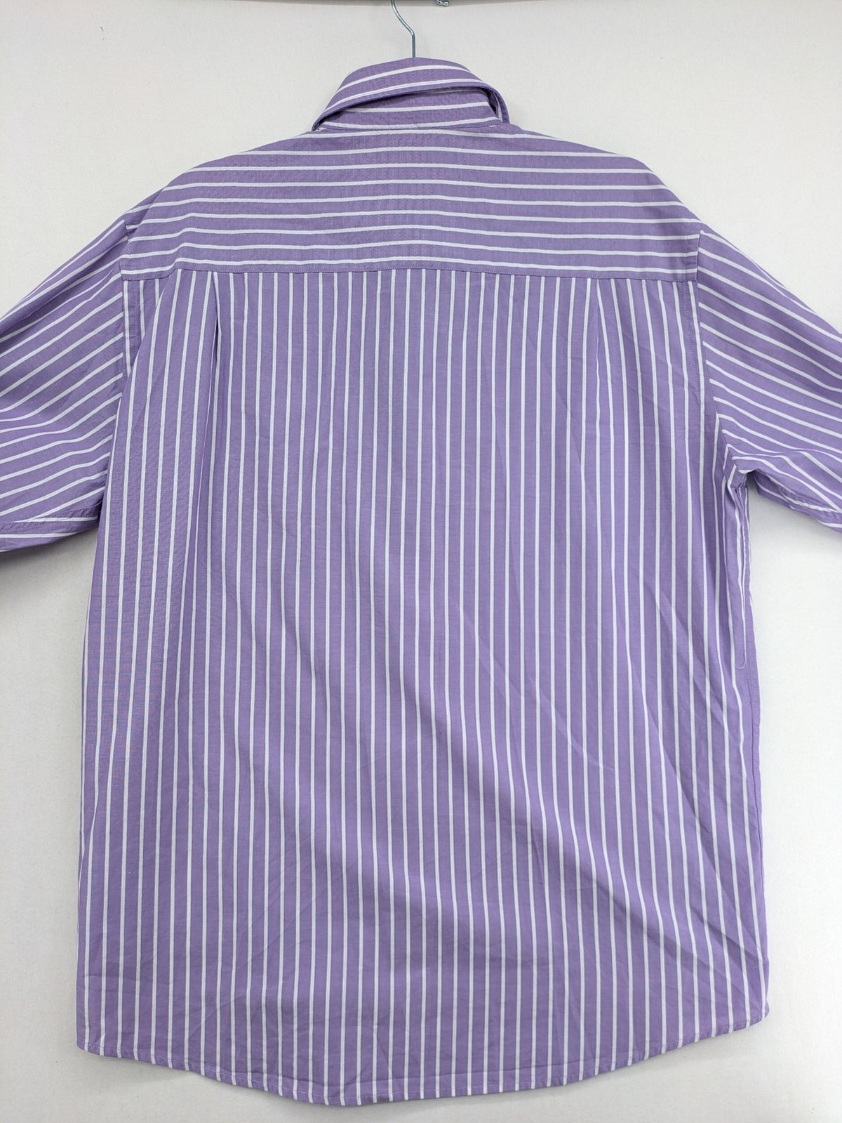 C.Comberti pink button-up shirt with vertical purple and white stripes, easy-care fabric.