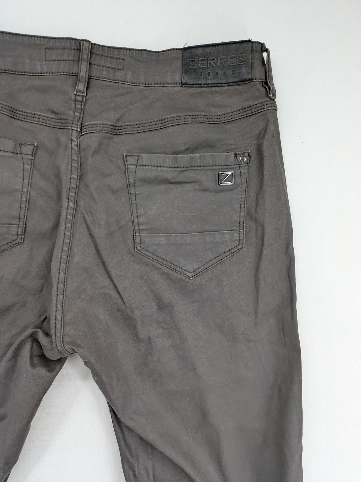 Zerres grey slim fit chino pants with ankle zippers and classic 5-pocket design.