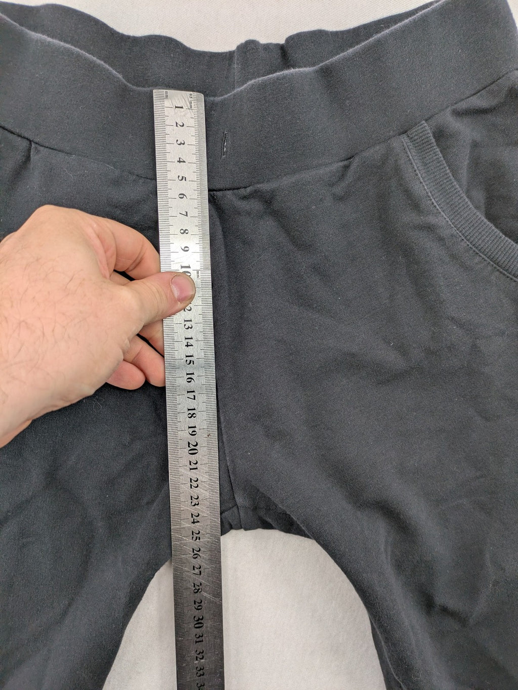 Manguun Sports grey jogger pants soft cotton blend with subtle logo embroidery and elastic waistband.