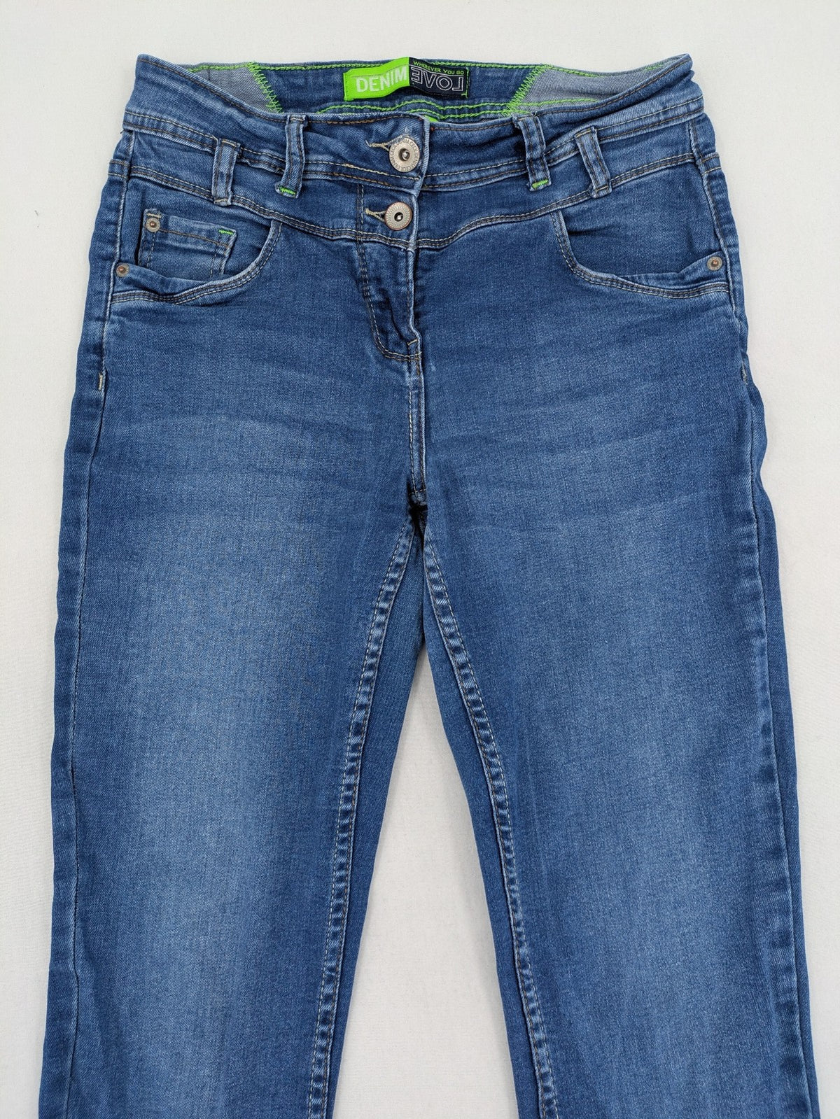 Cecil blue straight jeans with neon green accents and classic 5-pocket design.