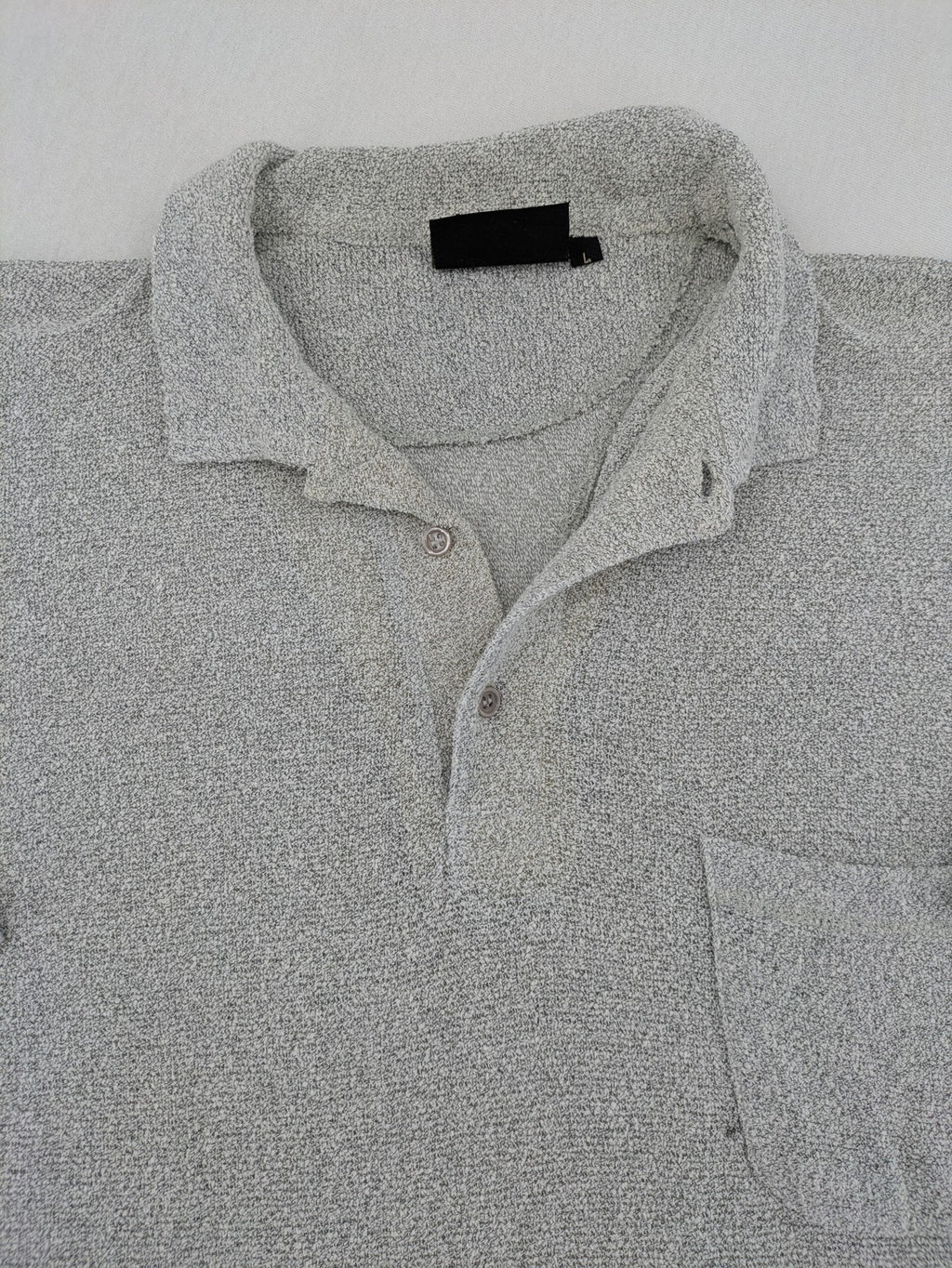 Headlands grey short sleeve polo shirt textured terry fabric with chest pocket.