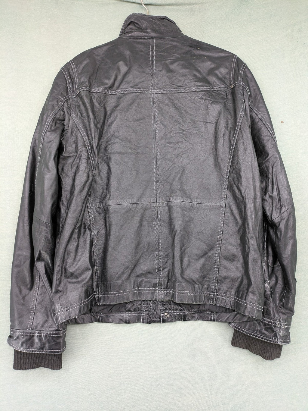 Tom Tailor black leather jacket vintage style with multiple pockets and contrast stitching.