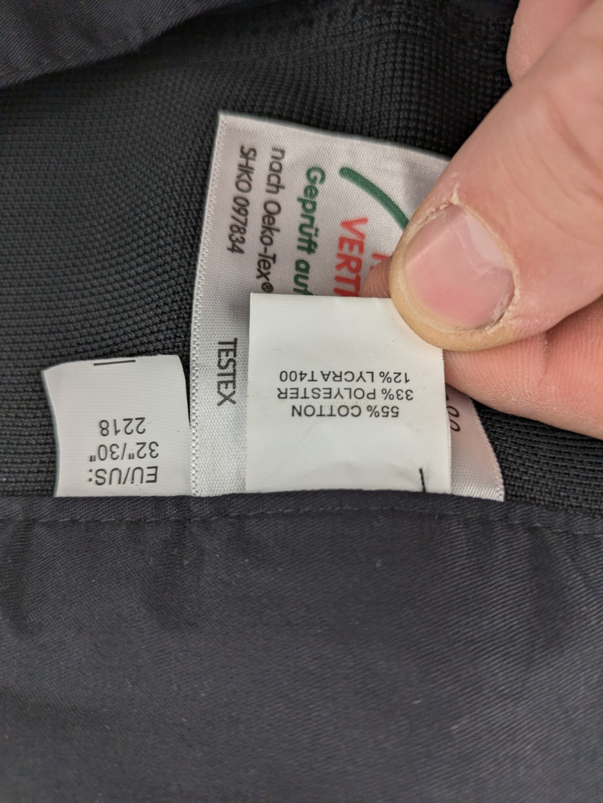 DHL grey cargo pants with iconic logo and multiple pockets, made from stretch cotton.