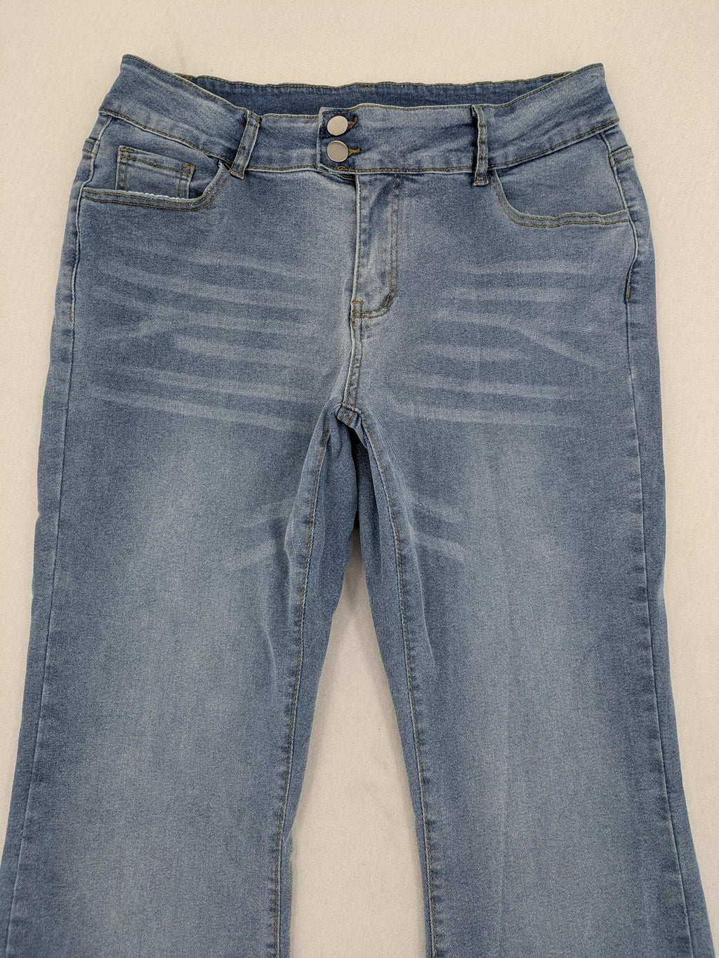 C&A blue bootcut jeans high waist stretch denim with double button closure.