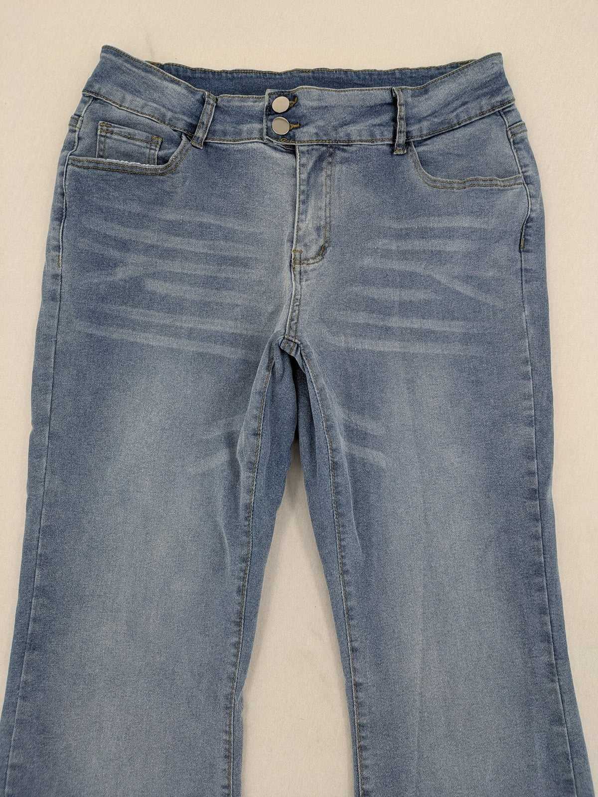 C&A blue bootcut jeans high waist stretch denim with double button closure.