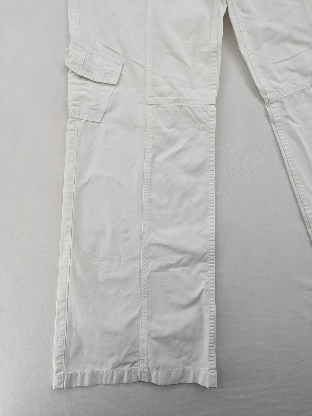 Street One white cargo pants with side pockets and wide leg design.