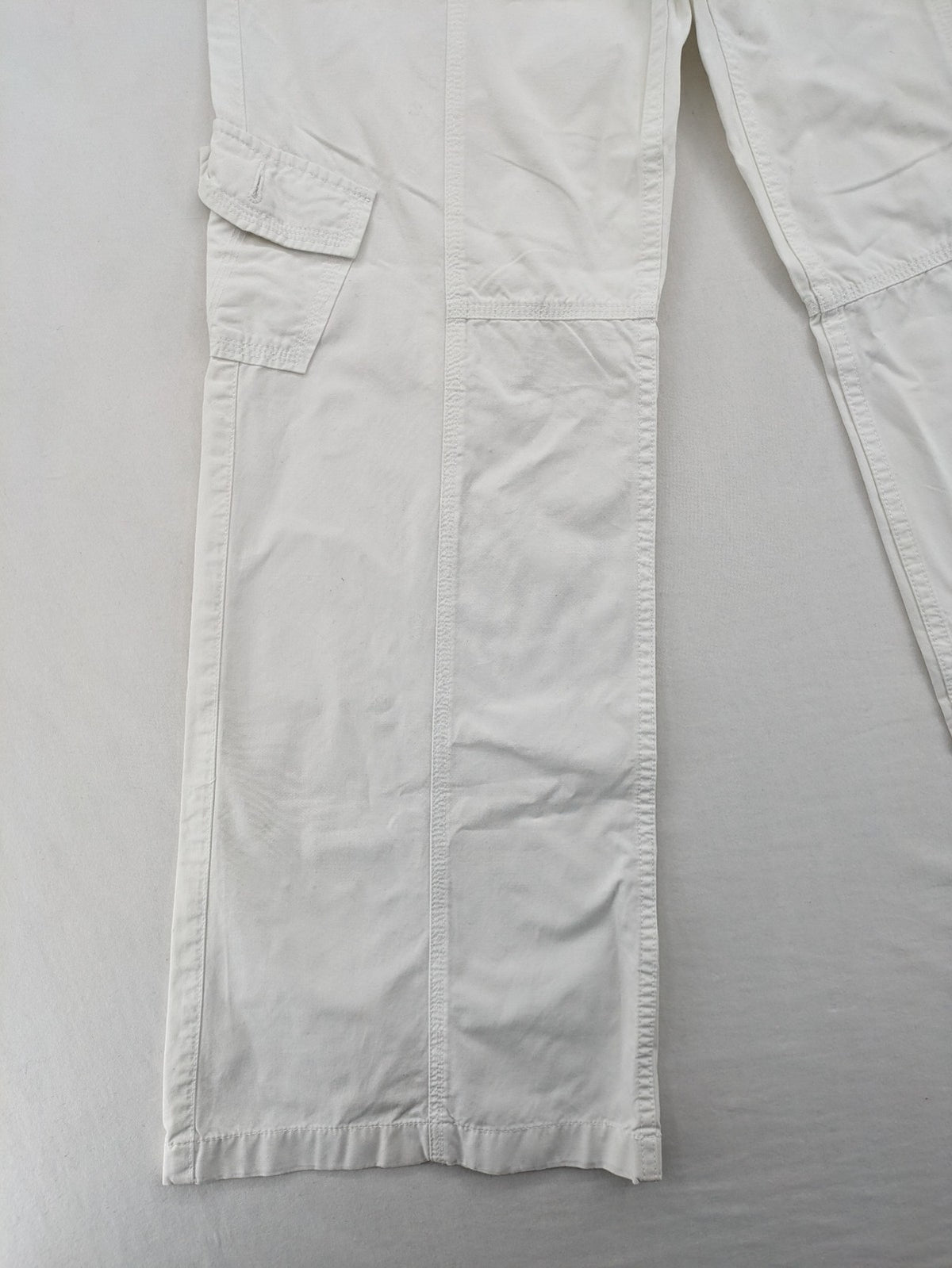 Street One white cargo pants with side pockets and wide leg design.