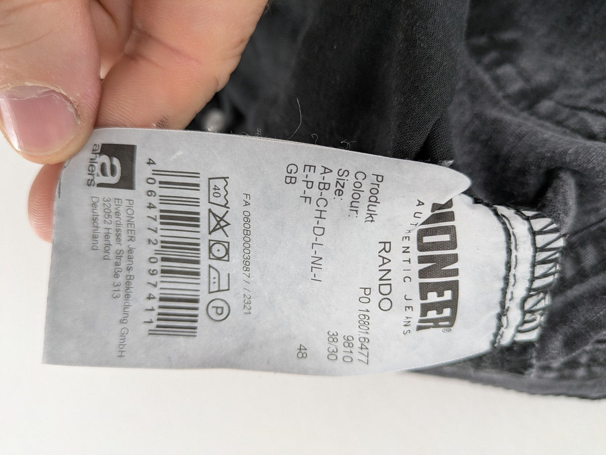 Pioneer grey straight jeans with washed finish and stretch material, classic design.