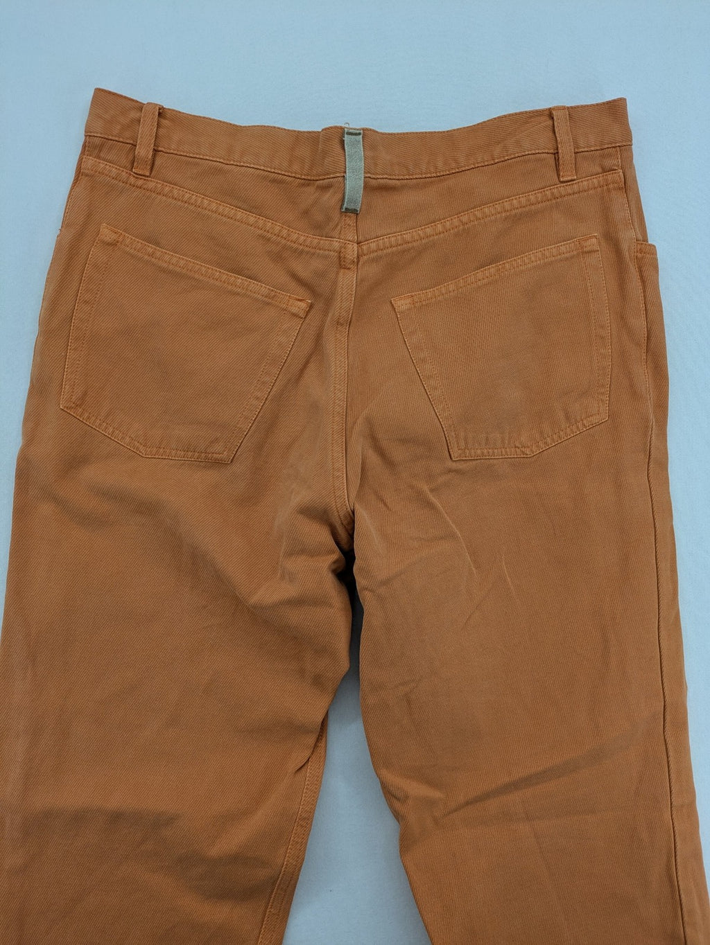 Loro Piana orange straight jeans 5-pocket style made of 100% cotton.