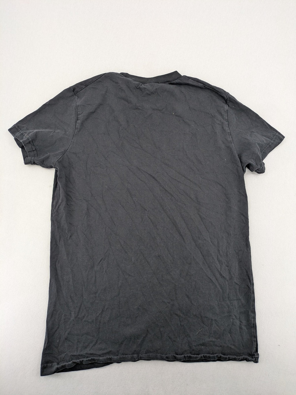 Dsquared2 grey short sleeve shirt with red maple leaf and smiley face graphic.