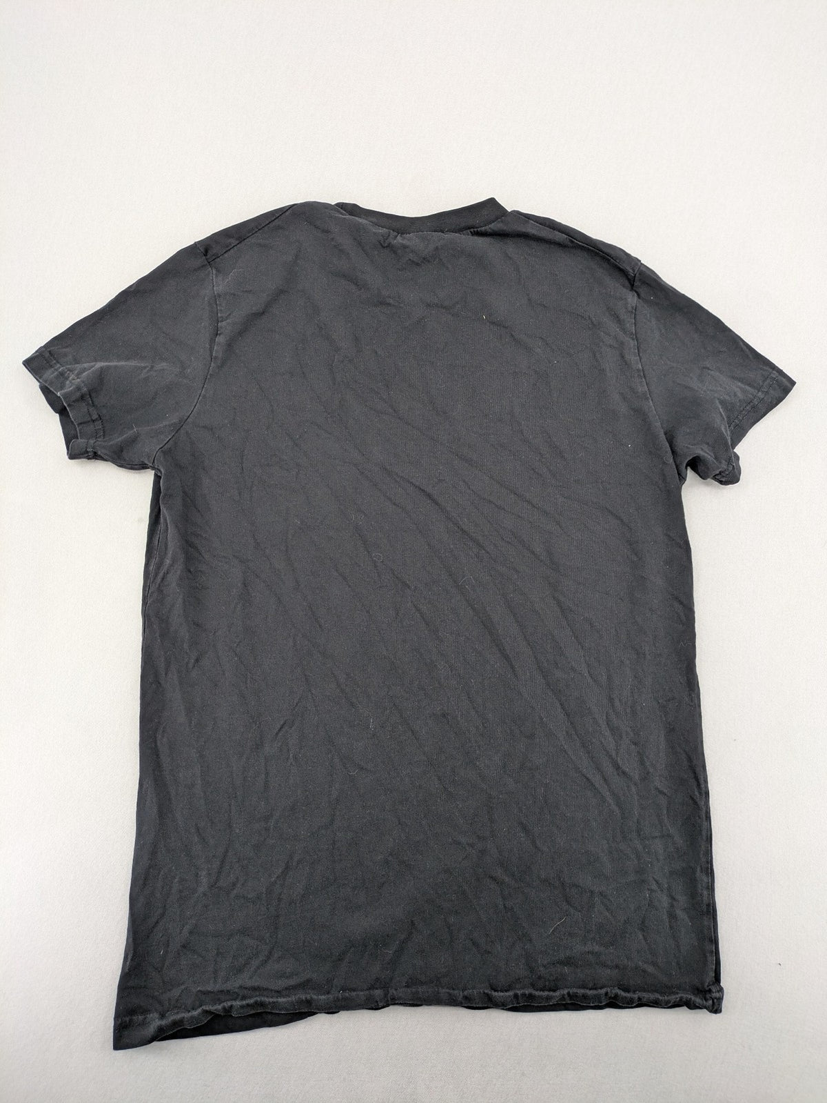 Dsquared2 grey short sleeve shirt with red maple leaf and smiley face graphic.
