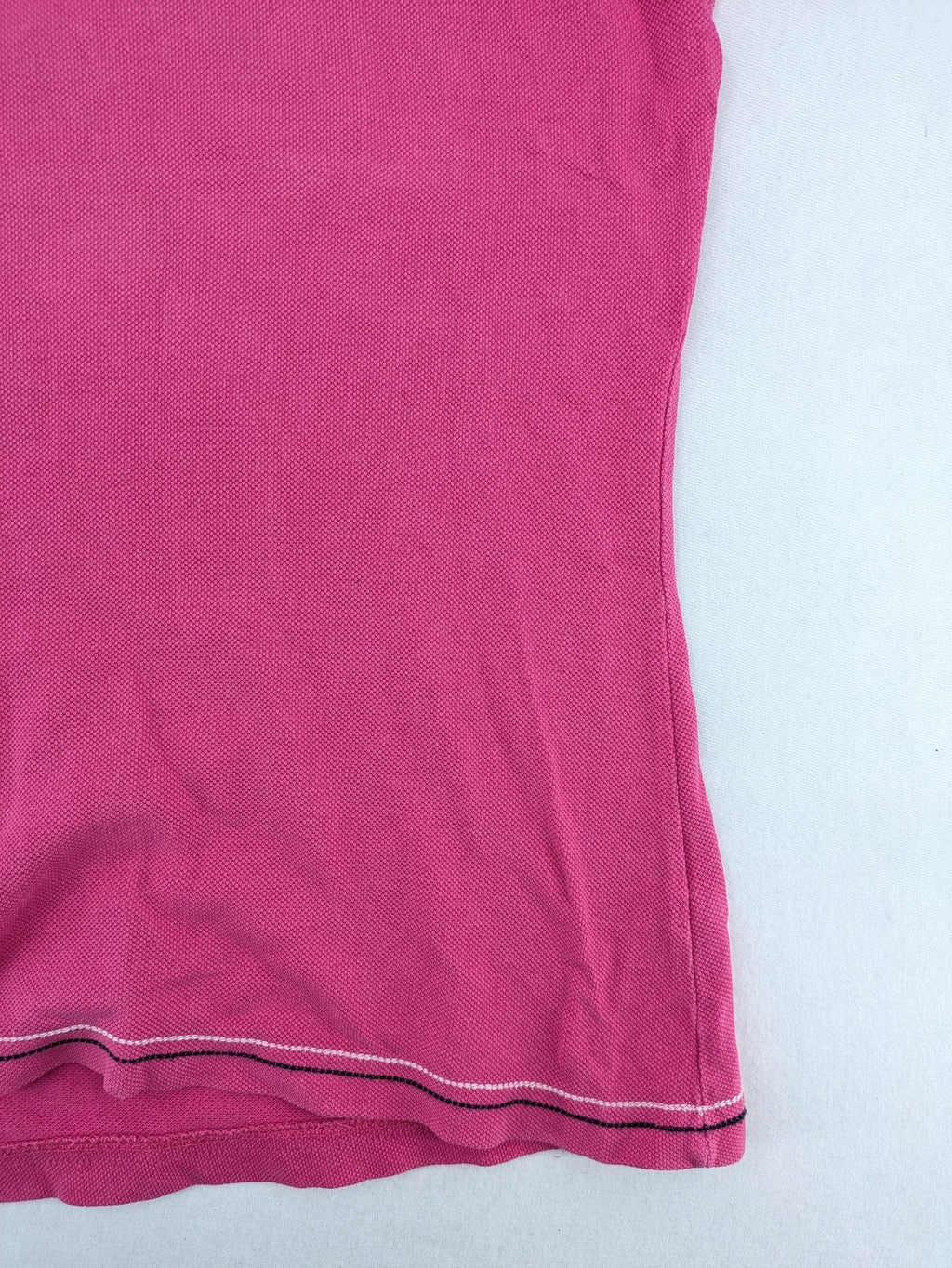 Geographical Norway pink polo shirt with embroidered Saint Malo design and Gingham trim.