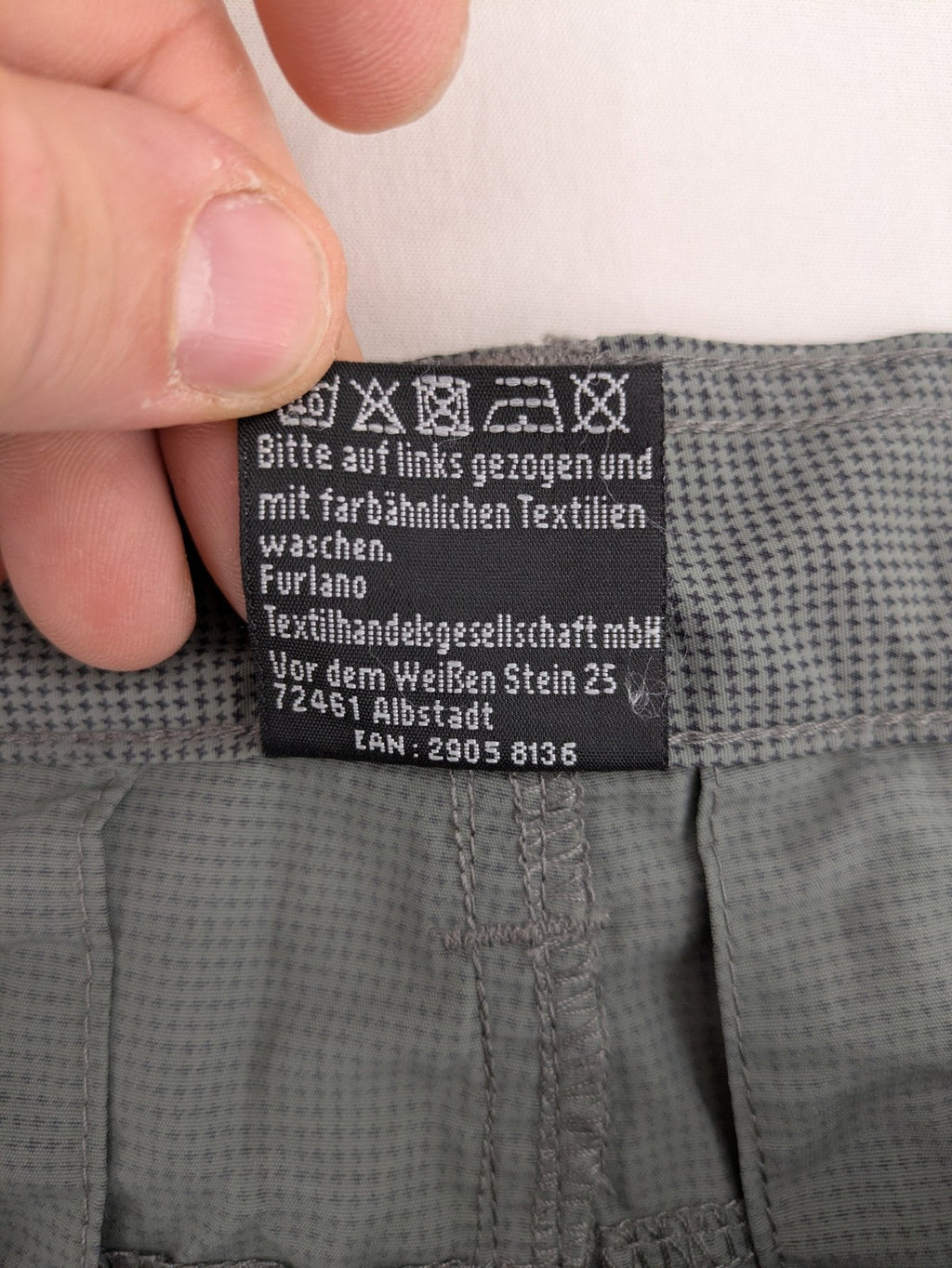Luciano grey shorts lightweight polyamide with elastic waistband and button closure.