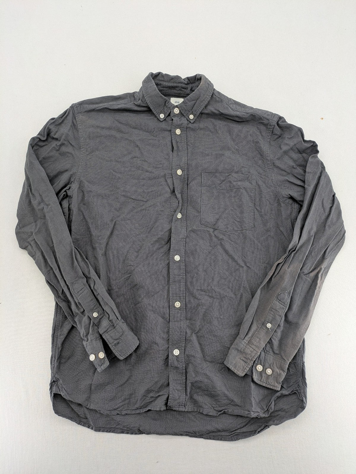 H&M L.O.G.G. grey button-down shirt, regular fit, single chest pocket, cotton material.