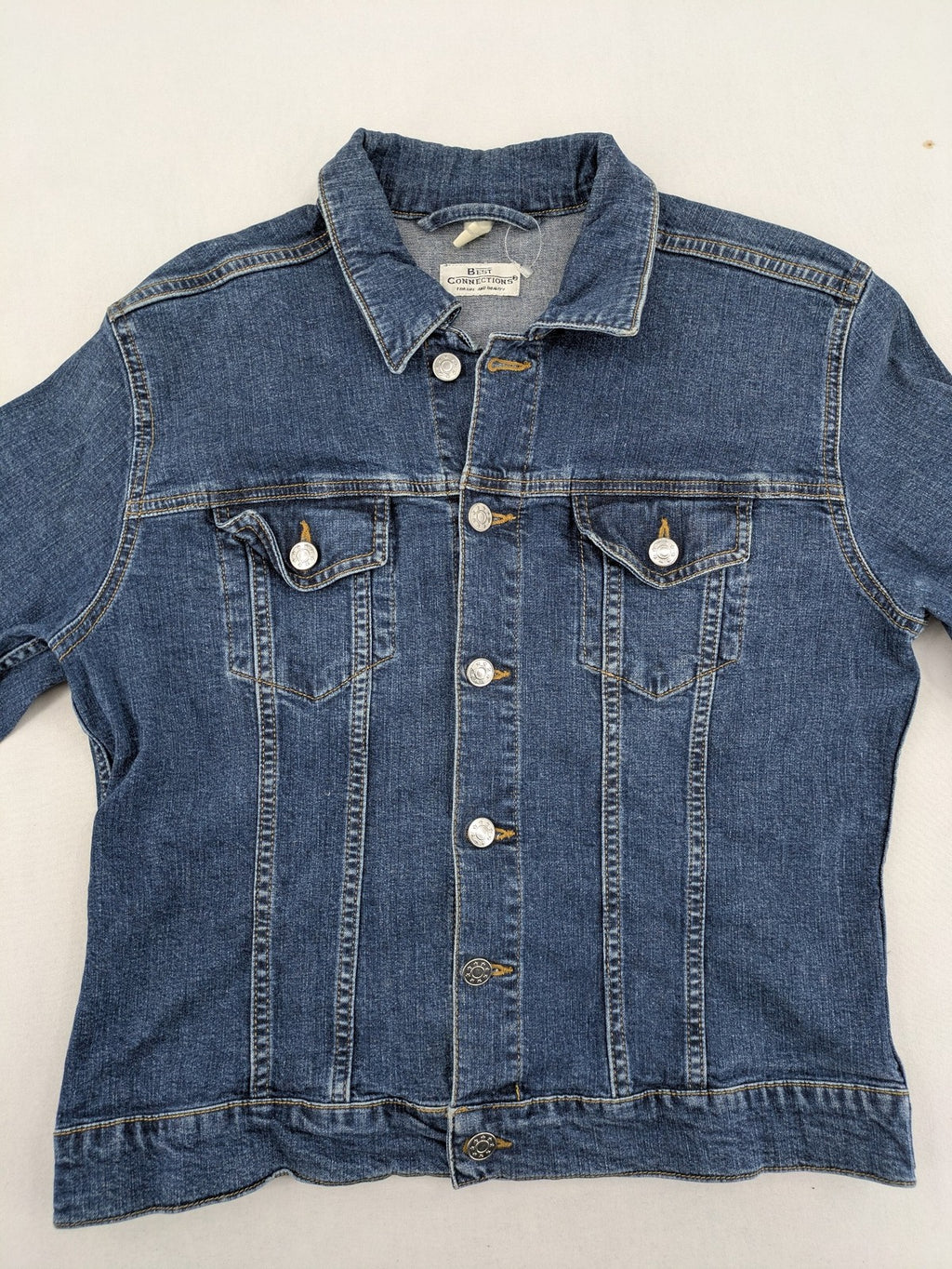 Best Connections cream denim jacket classic design with button placket and two chest pockets.