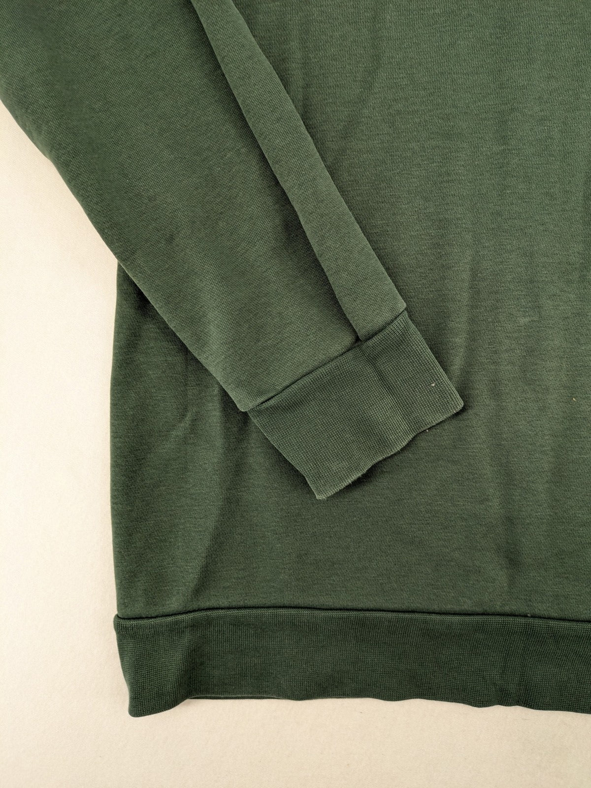 Pull & Bear green sweatshirt with embroidered Germany eagle patch and mock neck.
