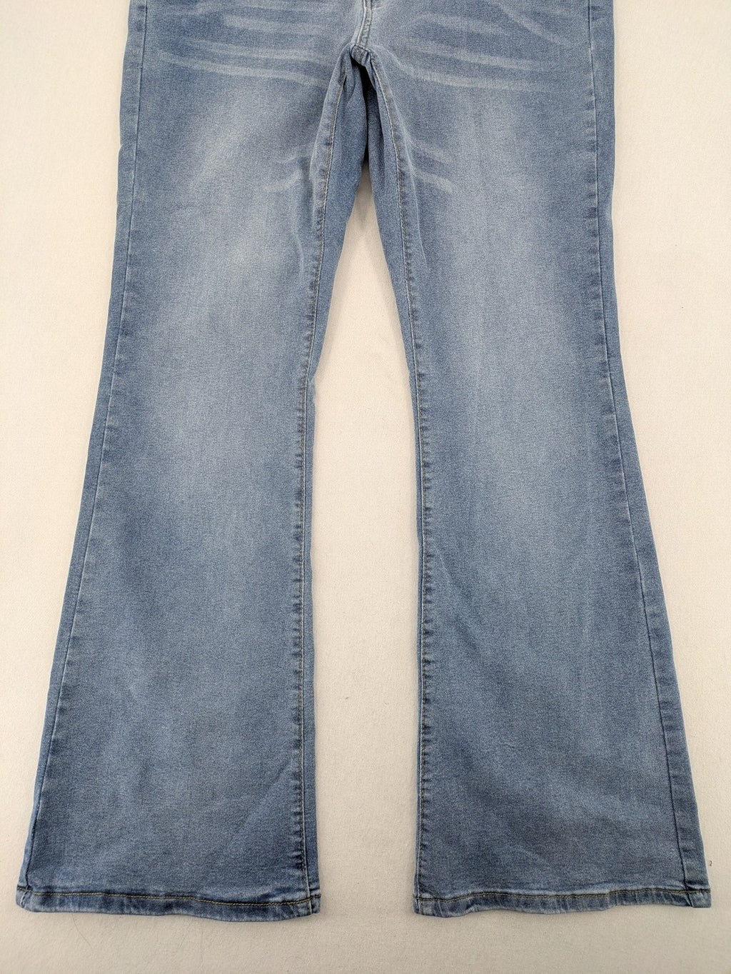 C&A blue bootcut jeans high waist stretch denim with double button closure.